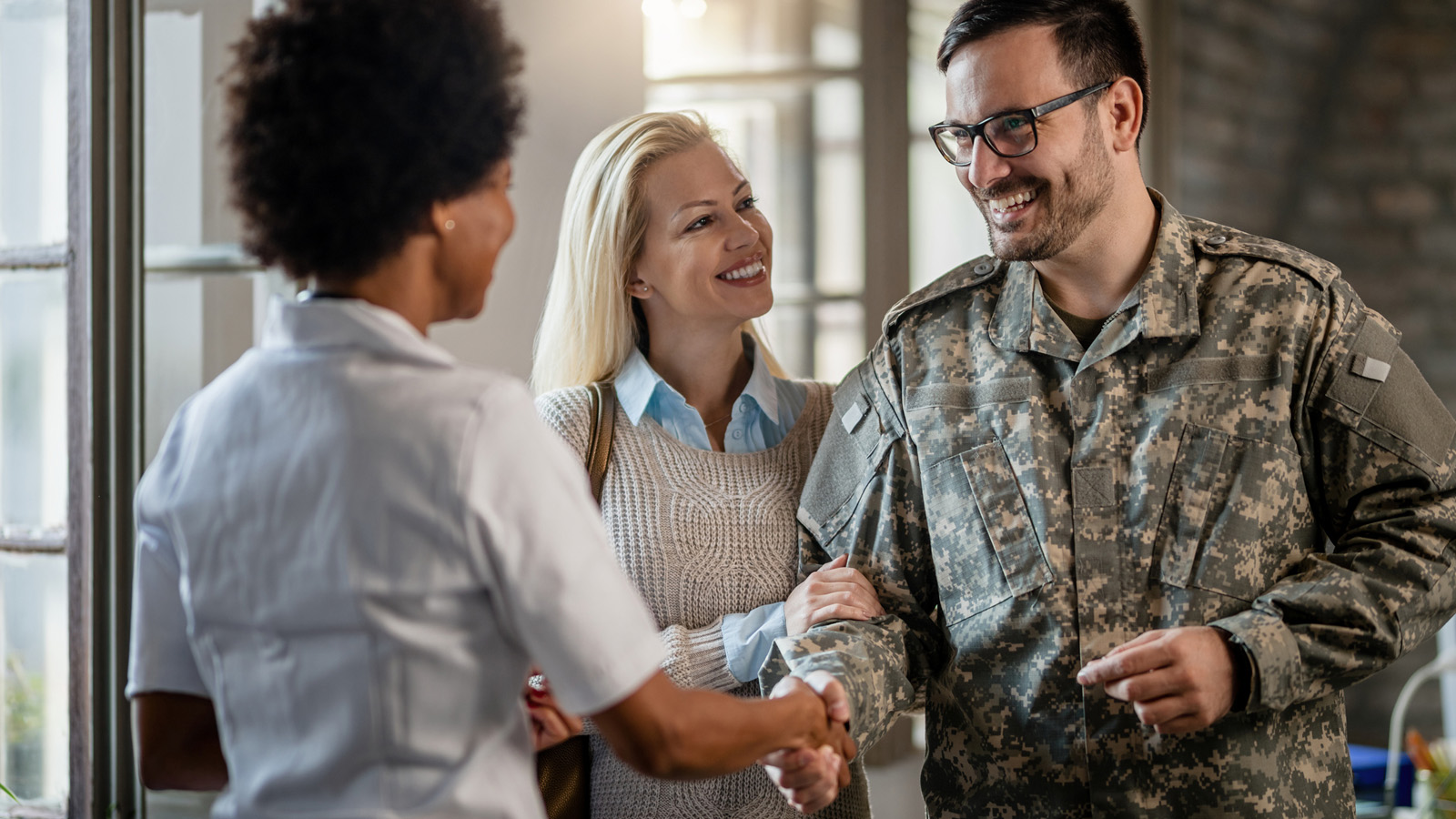 Loan officer assisting veteran