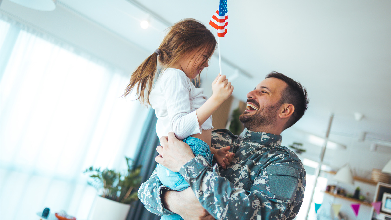 Veteran family celebrating in new home